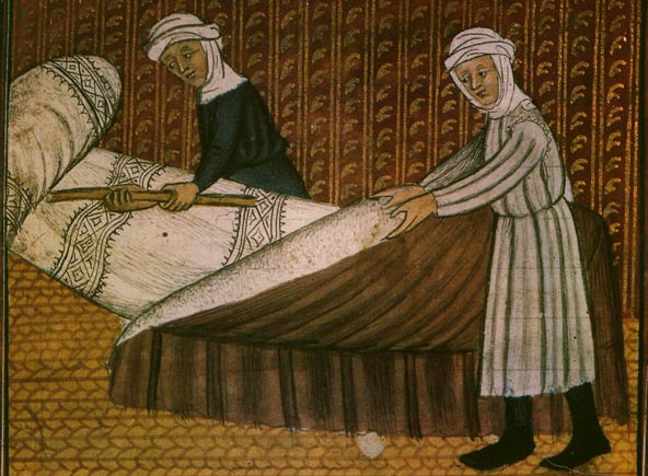gasthuiszusters maken de bedden klaar voor pelgrims. Miniatuur, 15de eeuw. Parijs, Bibl. Ste-Genevive