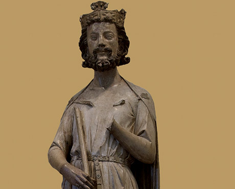 Koning Childebert I, stichter van het oudst-bekende leken-initiatief. Kalkstenen beeld, 1239. Parijs, Louvre.