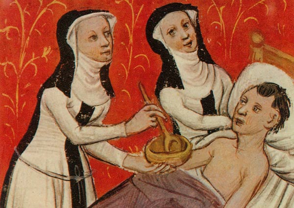 Twee zusters geven een zieke te eten. Min., ca. 1400. Doornik, kathedraalarchief